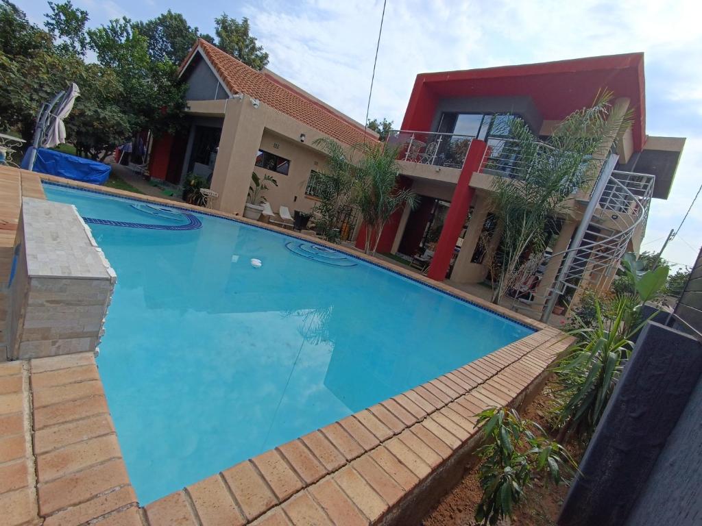 Manasseh Guest House exterior and guest areas