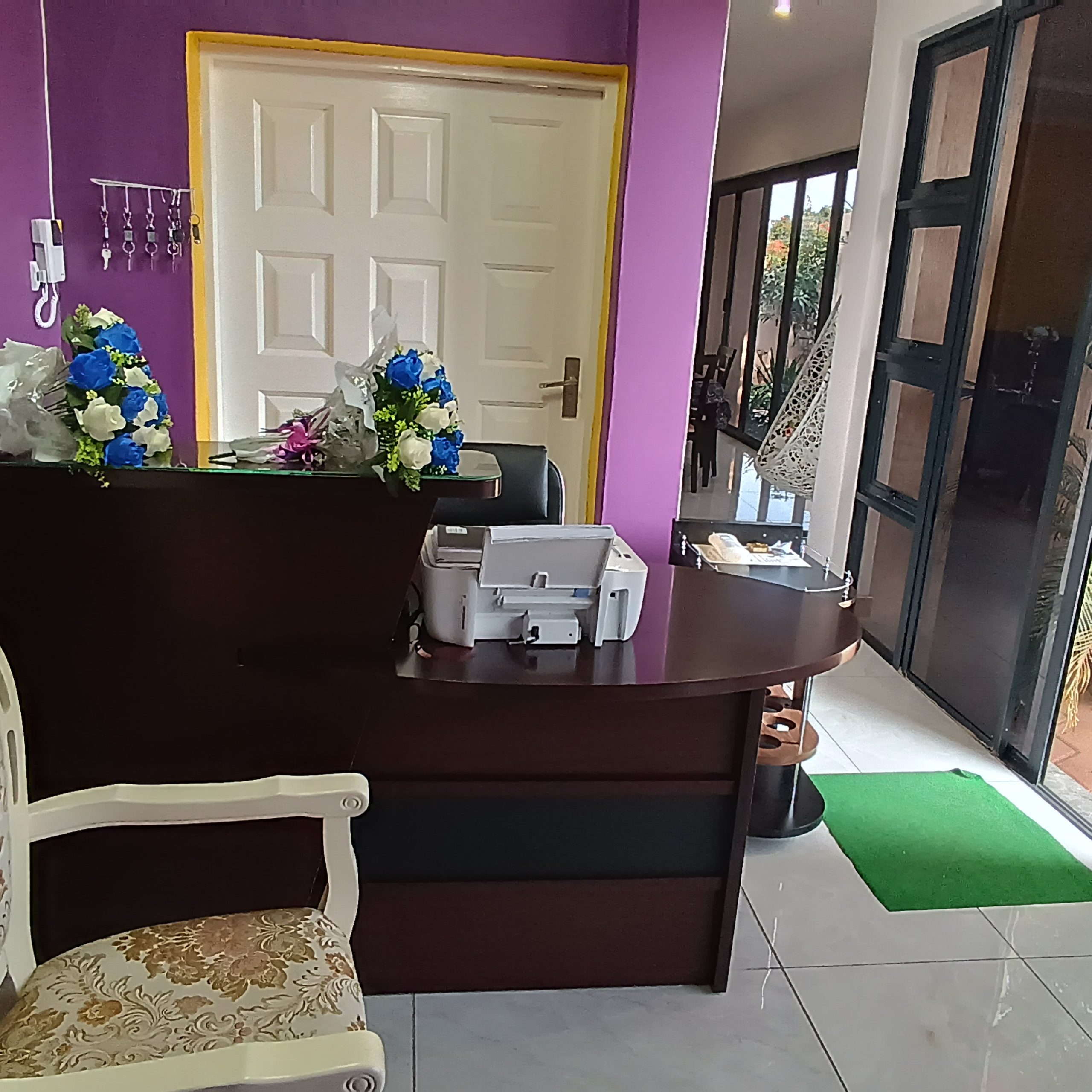 Reception and guest assistance area at Manasseh Guest House
